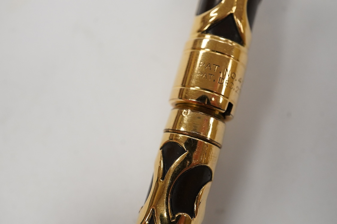 A rare Mabie Todd & Co. gold filled filigree chatelaine eye-dropper with flexible nib with over- and-under feed